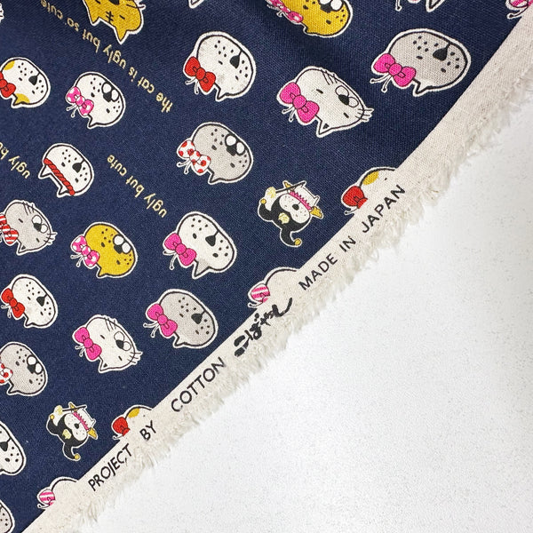 Ugly But Cute Cat Canvas Fabric in Blue - Cotton Linen Blend by Cotton Kobayashi