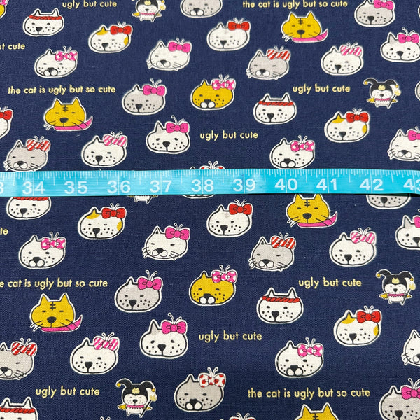 Ugly But Cute Cat Canvas Fabric in Blue - Cotton Linen Blend by Cotton Kobayashi