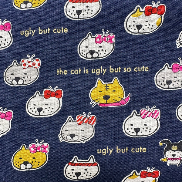 Ugly But Cute Cat Canvas Fabric in Blue - Cotton Linen Blend by Cotton Kobayashi