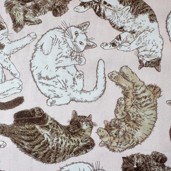 Close up of 365 Cat Art There Are Cats Everywhere cotton fabric by Kokka in pink, EKX-1710-2A