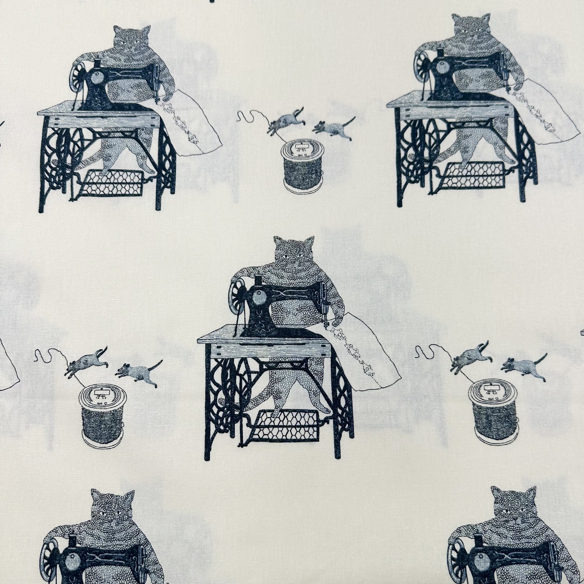 Cats on Treadle Sewing Machines by Naoya Hata Cotton Linen Fabric, Koizumi Imported from Japan, Ivory