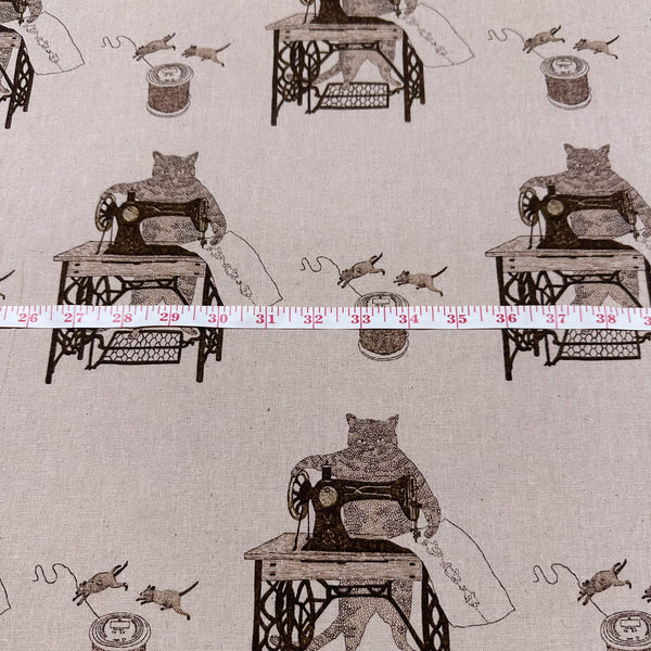 Cats on Treadle Sewing Machines by Naoya Hata Cotton Linen Fabric, Koizumi Imported from Japan, lt brown