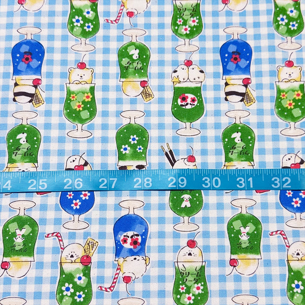 Delicious Animal Cream Soda blue cotton oxford fabric by Kokka Fabrics, Scale of playful animal print
