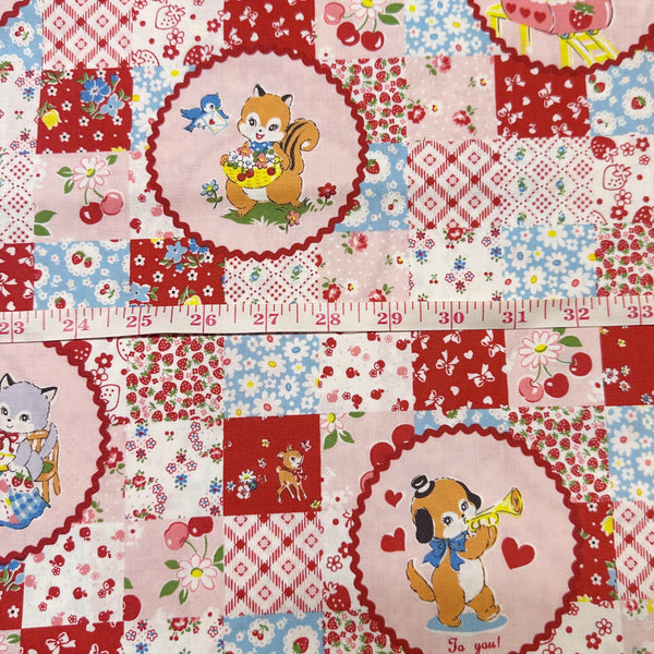 Scale of Fancy Animal Circle Red cotton fabric from Atsuko Matsuyama Yuwa 30’s Collection, perfect for quilting and crafts.