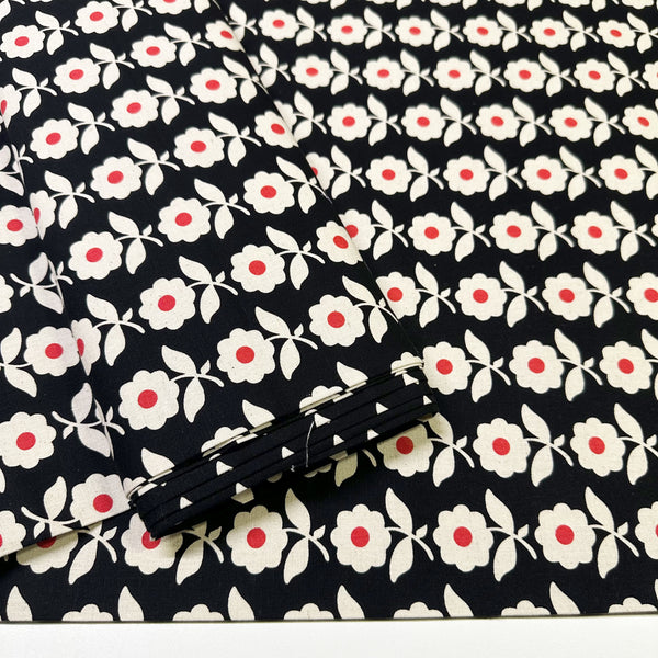 Flower Chain Canvas Fabric on Black - Cotton Linen Blend by Sevenberry