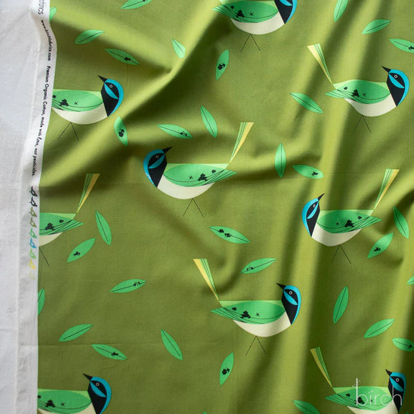Selvage of Green Jay organic cotton poplin fabric by Charley Harper for Birch Fabrics featuring a mid-century bird design in calming green tones.