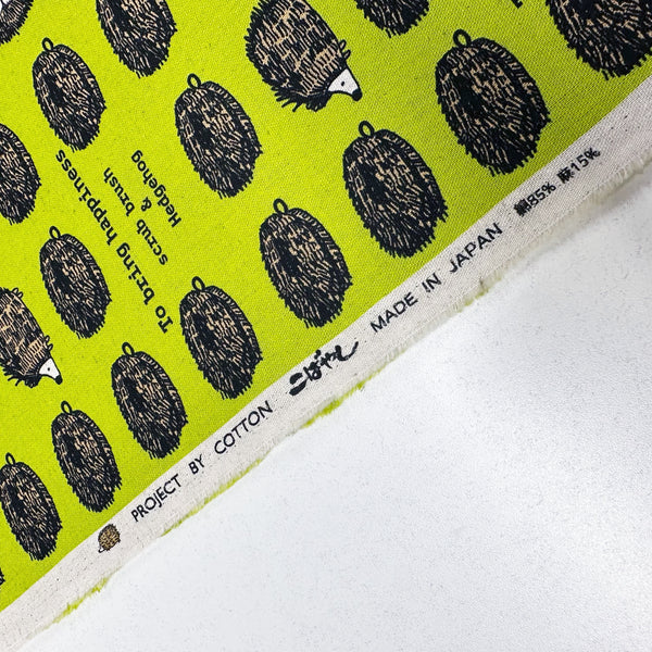 Hedgehog Scrub Brushes Canvas Fabric in Green - Cotton Linen Blend by Cotton Kobayashi