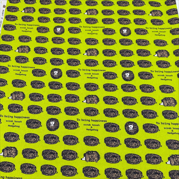 Hedgehog Scrub Brushes Canvas Fabric in Green - Cotton Linen Blend by Cotton Kobayashi