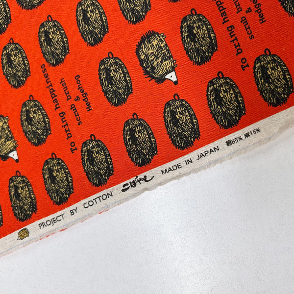 Hedgehog Scrub Brushes Canvas Fabric in Red - Cotton Linen Blend by Cotton Kobayashi