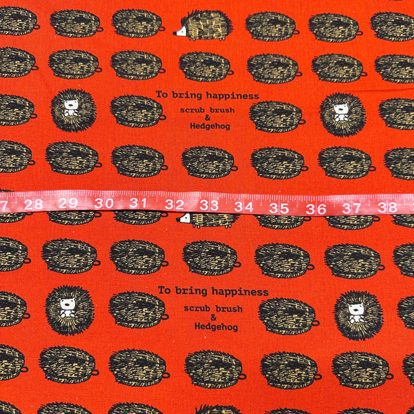 Hedgehog Scrub Brushes Canvas Fabric in Red - Cotton Linen Blend by Cotton Kobayashi