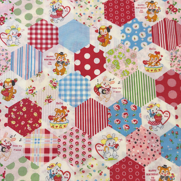 Hexagon Animals Red cotton fabric from Atsuko Matsuyama Yuwa 30’s Collection, perfect for quilting and crafts.