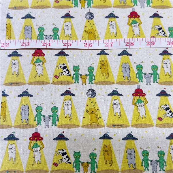 Scale of Alien Kitties Cotton Linen Canvas fabric in Natural by Cotton Kobayashi