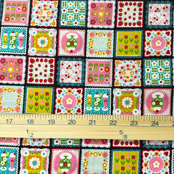 Scale of Sweet Treat Patchwork cotton fabric in black