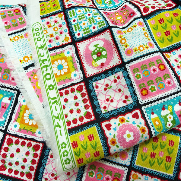 Selvage of Sweet Treat Patchwork cotton fabric in black