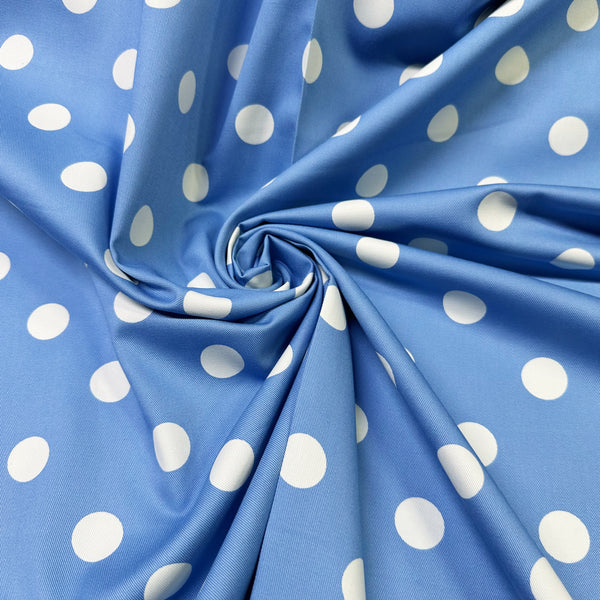Drape photo of medium polka dot blue cotton twill fabric by Sevenberry