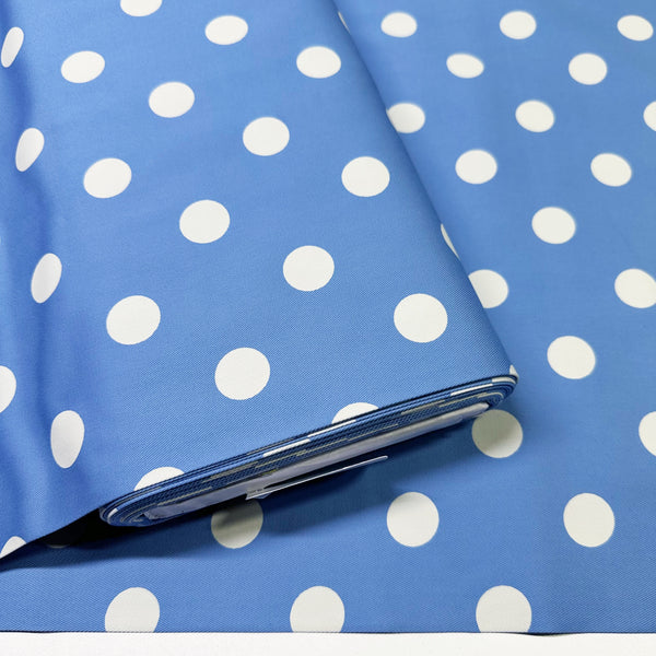 Bolt of medium polka dot blue cotton twill fabric by Sevenberry
