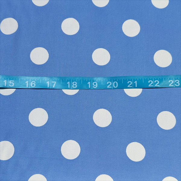 Scale of medium polka dot blue cotton twill fabric by Sevenberry