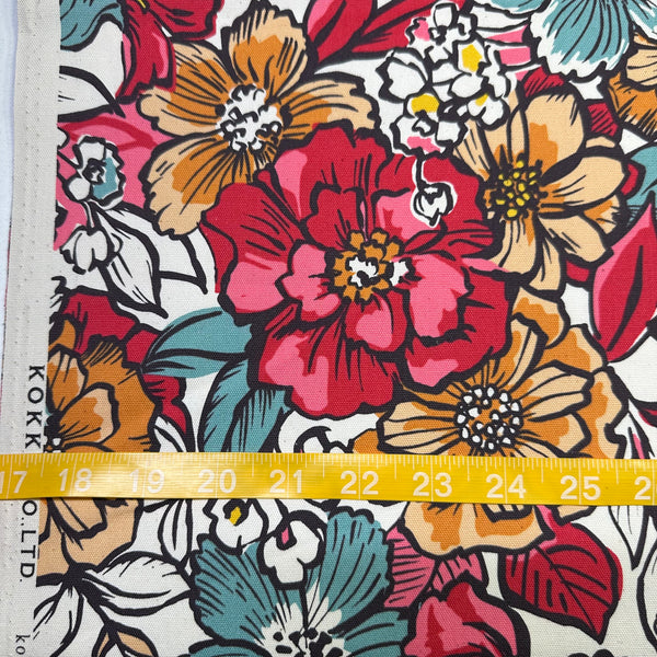Scale of Jambo Floral Cotton Oxford Fabric in Pink by Kokka Japan, featuring bold painted-style floral print on mid-weight cotton