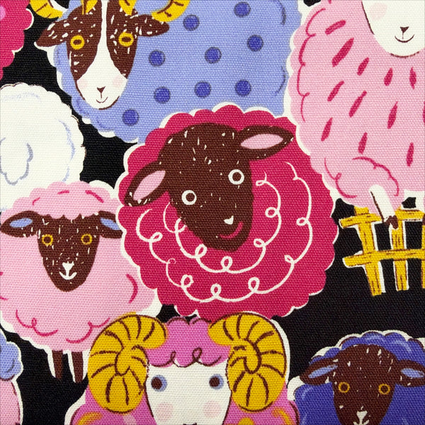 Close up of Powerful Animals Sheep cotton oxford fabric by Kokka in black, YGA-96010-1D