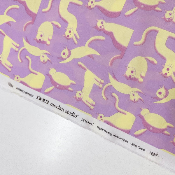 Purple Wide Eyed Cats Cotton Fabric by Nora. Imported from Japan