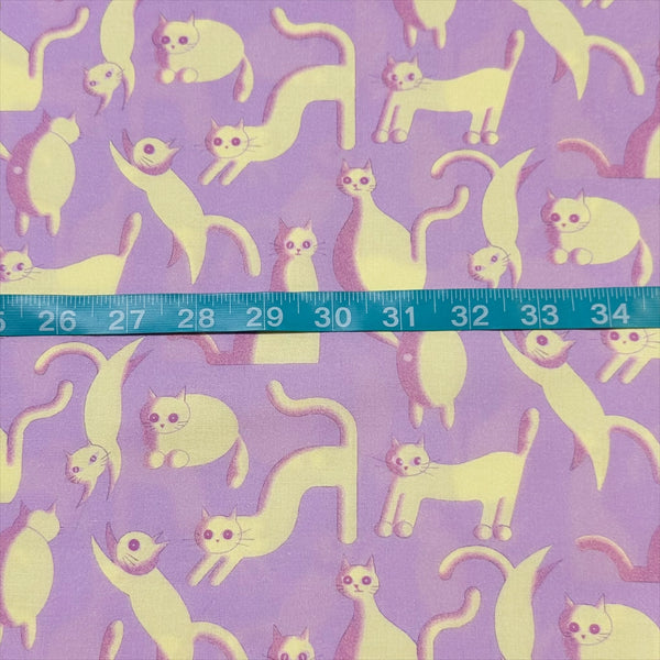 Purple Wide Eyed Cats Cotton Fabric by Nora. Imported from Japan
