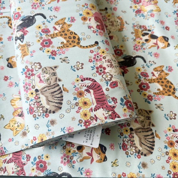 Bolt Photo of of Powerful Animal Cats Garden cotton oxford fabric by Kokka in blue, style YGA-81050-1 C