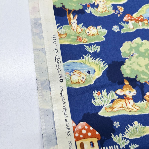 Retro Deer and Mushroom Houses Cotton Fabric in Navy, Un/No for Cosmo Textile