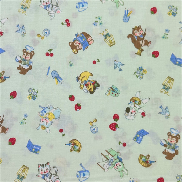 zoom out of Tiny Animals mint cotton fabric from Atsuko Matsuyama Yuwa 30’s Collection, perfect for quilting and crafts.