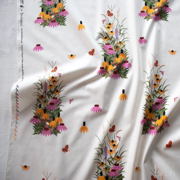 Selvage of Wildflowers organic cotton poplin fabric by Charley Harper for Birch Fabrics featuring a mid-century minimal realism floral design with an airy feel.