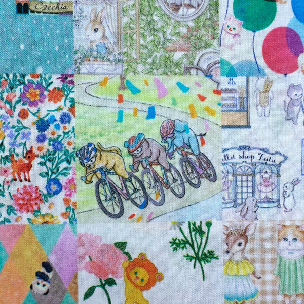 Close up scene of Anniversary Patchwork cotton lawn fabric in blue by Yukiemon for Hokkoh featuring patchwork squares with adorable animals, playful scenes, and charming illustrated motifs, imported from Japan