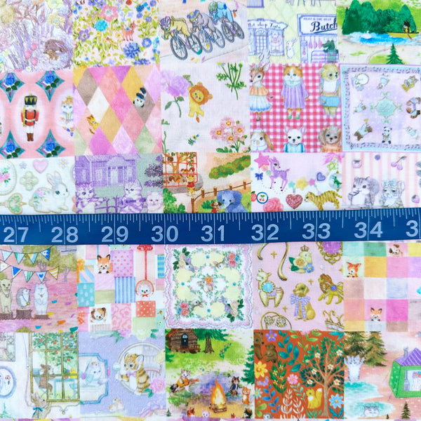 Scale of Anniversary Patchwork cotton lawn fabric in pink by Yukiemon for Hokkoh featuring patchwork squares with adorable animals, playful scenes, and colorful illustrated motifs, imported from Japan