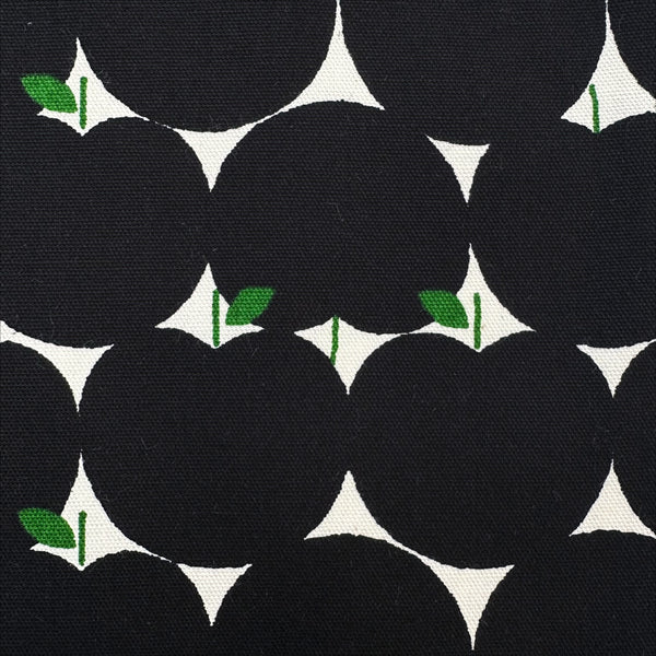 Close up of Apples Cotton Oxford fabric by Sevenberry, style 850551, in black and neutral