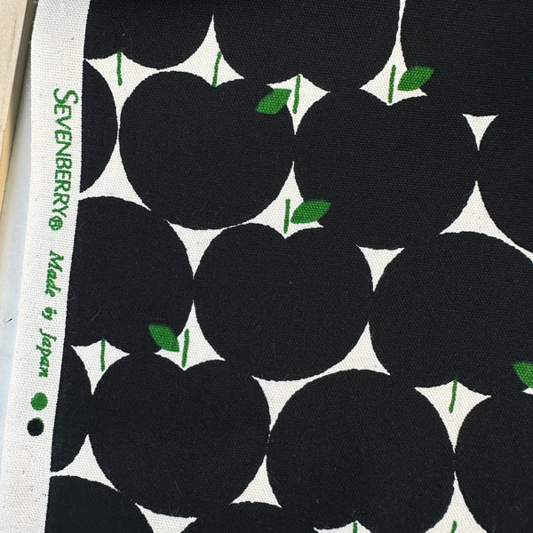 Selvage of Apples Cotton Oxford fabric by Sevenberry, style 850551, in black and neutral