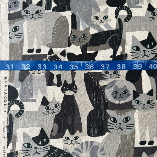 Scale of Art Animal Cats Cotton Linen Blend Canvas Fabric by Kokka, style YGA-91060 1B, featuring cat illustrations, in gray and multi