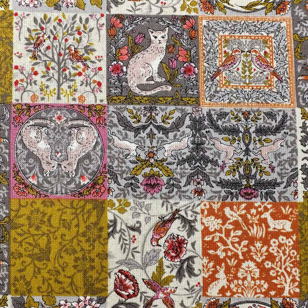 Close up of Art Nouveau Symphony Patchwork Animal cotton fabric in blue multi, imported from Japan