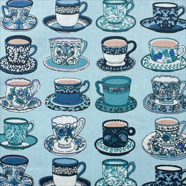 Close up of Art Nouveau Symphony Tea Cups cotton fabric in blue, imported from Japan