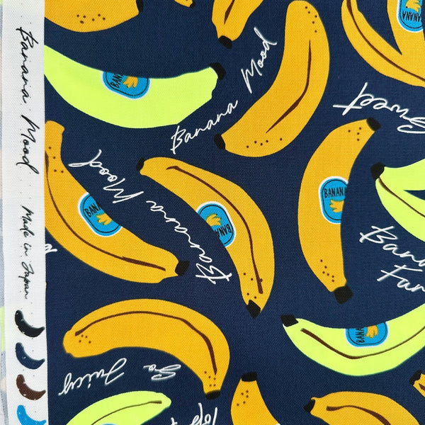 Selvage detail of Banana Mood Cotton Oxford fabric, Neon Yellow & Navy colorway, imported from Japan