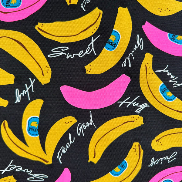 Banana Mood cotton Oxford fabric in neon pink and black Japanese import fabric featuring a banana print