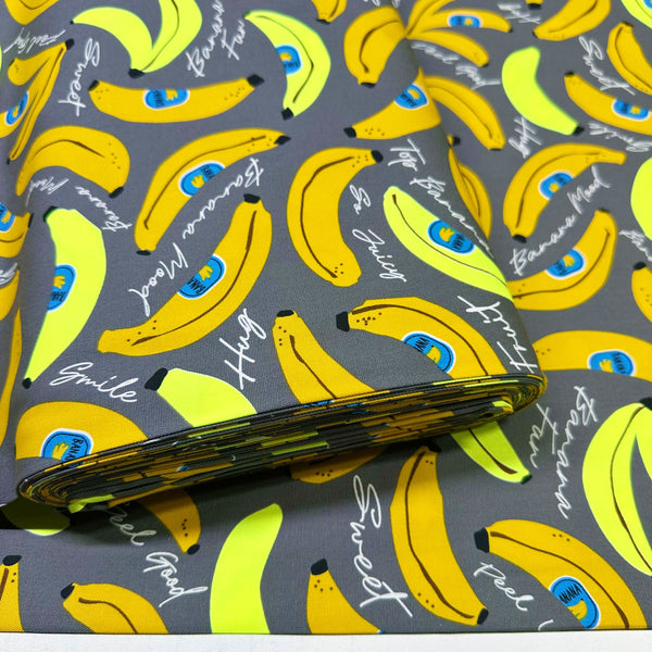 Bolt of Banana Mood Oxford cotton fabric in neon yellow and gray, Japanese Import, medium weight cotton for sewing and quilting