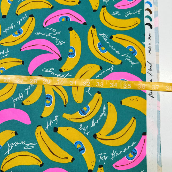 Scale of Banana Mood Oxford cotton fabric in teal and neon pink, Japanese Import, medium weight cotton for sewing and quilting