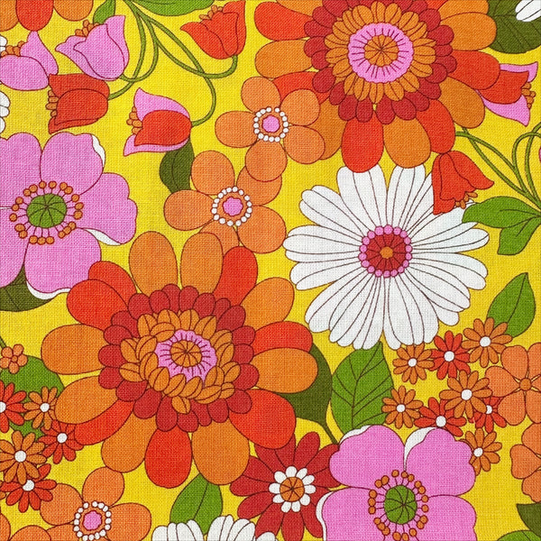 Close up of Bloom Garland Retro Floral Cotton Fabric by Koko Seki, in yellow, imported from Japan