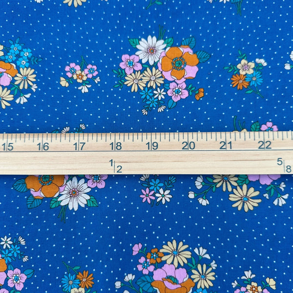 Scale of Full view of Bloom Garland Retro Floral and Polka Dot Cotton Fabric by Koko Seki, in blue, imported from Japan