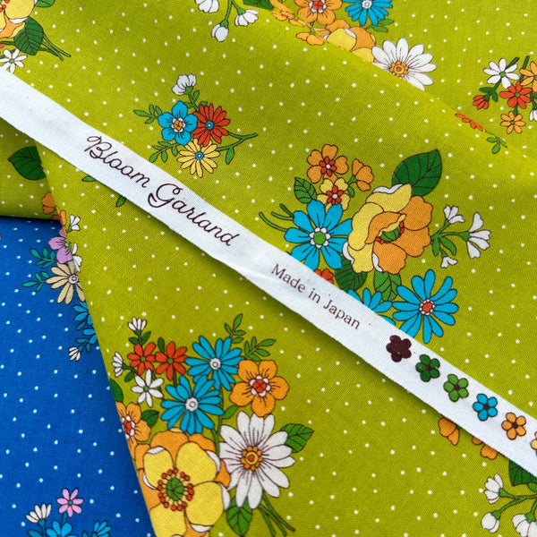 Selvage of Bloom Garland Retro Floral and Polka Dot Cotton Fabric by Koko Seki, in green, imported from Japan