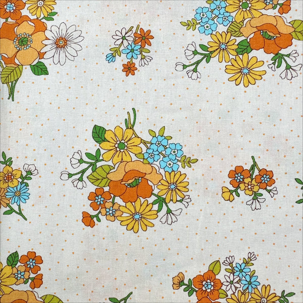 Close up of Bloom Garland Retro Floral and Polka Dot Cotton Fabric by Koko Seki, in natural, imported from Japan