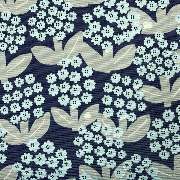 Close up of Blooming Day cotton oxford fabric by Kokka in navy, YKA-41050-1E