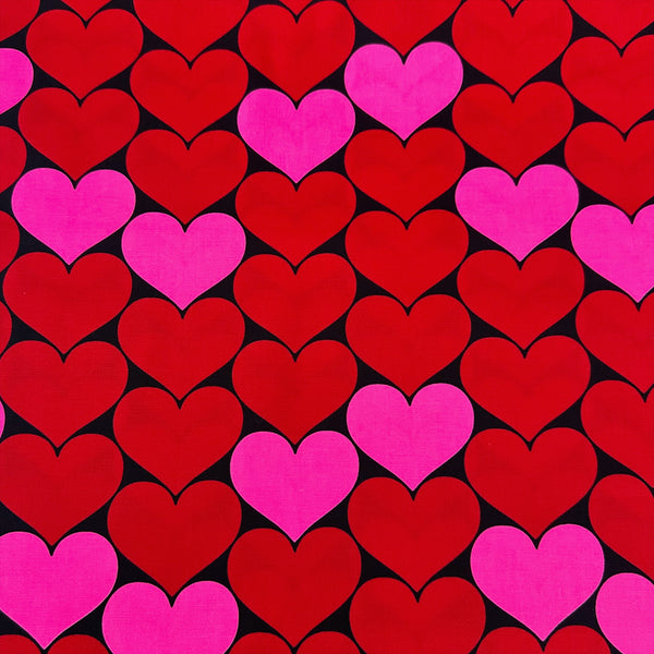Bon Bon Heart cotton Oxford fabric in neon pink and black featuring a large-scale heart print, imported from Japan