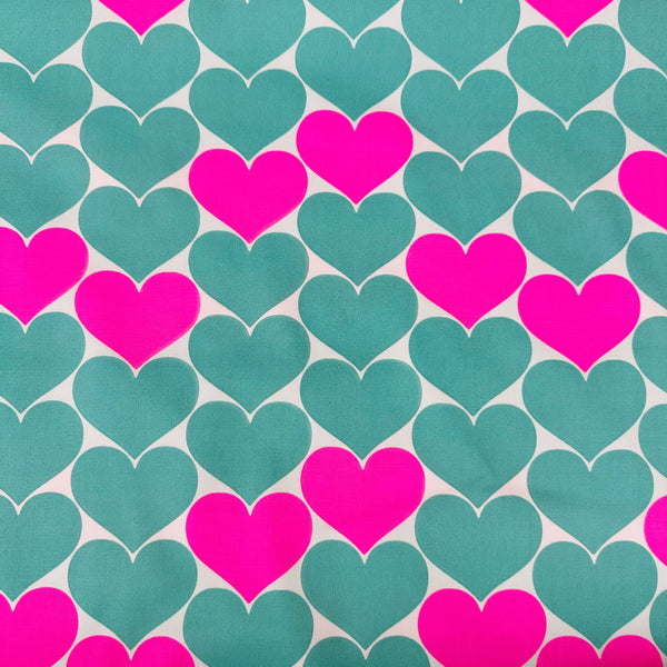 Bon Bon Heart cotton Oxford fabric in neon pink and green featuring a large-scale heart print, imported from Japan