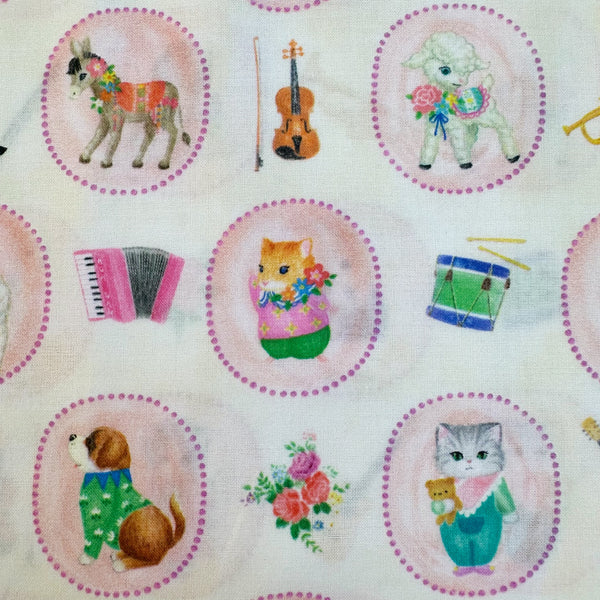 Cute animals in Bon Bon Journey Cotton Lawn Fabric in Ivory by Yukiemon for Hokkoh featuring whimsical travel-themed illustrations on soft Japanese cotton lawn.