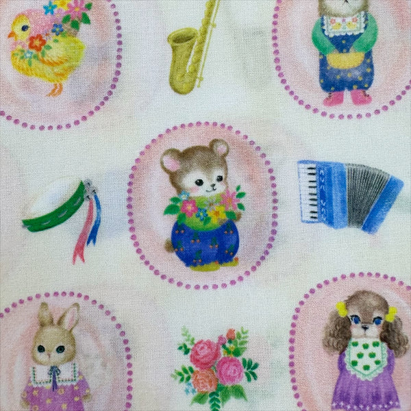 Cute bear in Bon Bon Journey Cotton Lawn Fabric in Ivory by Yukiemon for Hokkoh featuring whimsical travel-themed illustrations on soft Japanese cotton lawn.