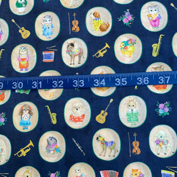 Scale of Bon Bon Journey Cotton Lawn Fabric in Navy by Yukiemon for Hokkoh featuring whimsical travel-themed illustrations on soft Japanese cotton lawn.